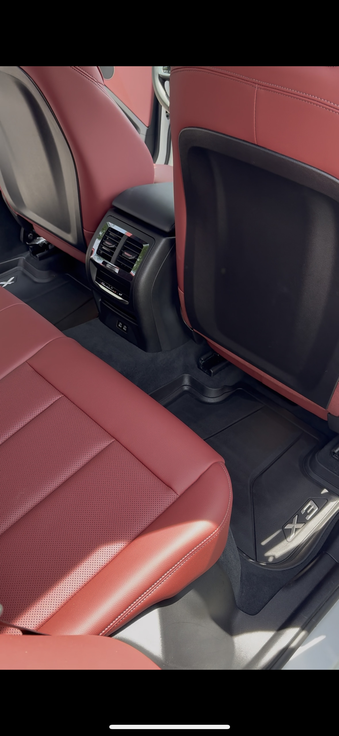 BMW X3 — burgundy backseat spotless finish